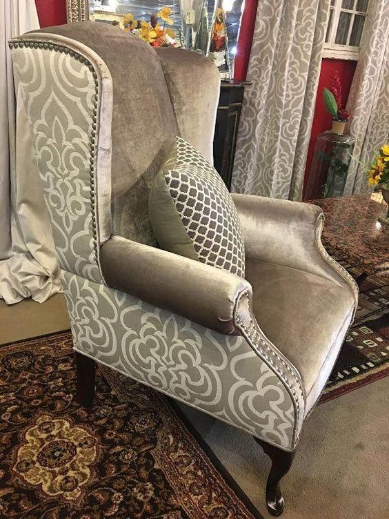 Classic wingback chair — detailed hand-tufted finish.